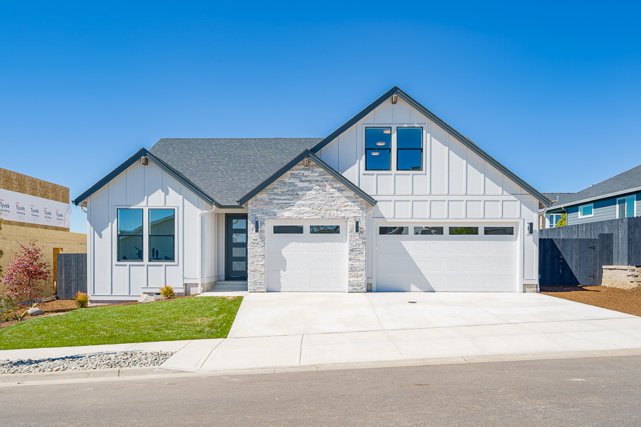 Two-story home exterior with stone accents, Lakeville plan, Paradise Pointe, Ridgefield WA